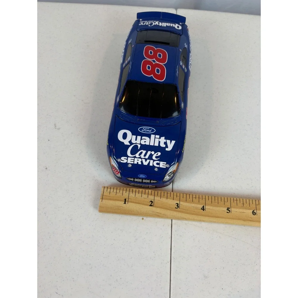 Dale Jarrett 88 Ford Quality Care Credit Taurus NASCAR 1:24 Diecast Car Blue